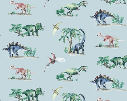 Pattern of various dinosaurs and plants on a light blue background
