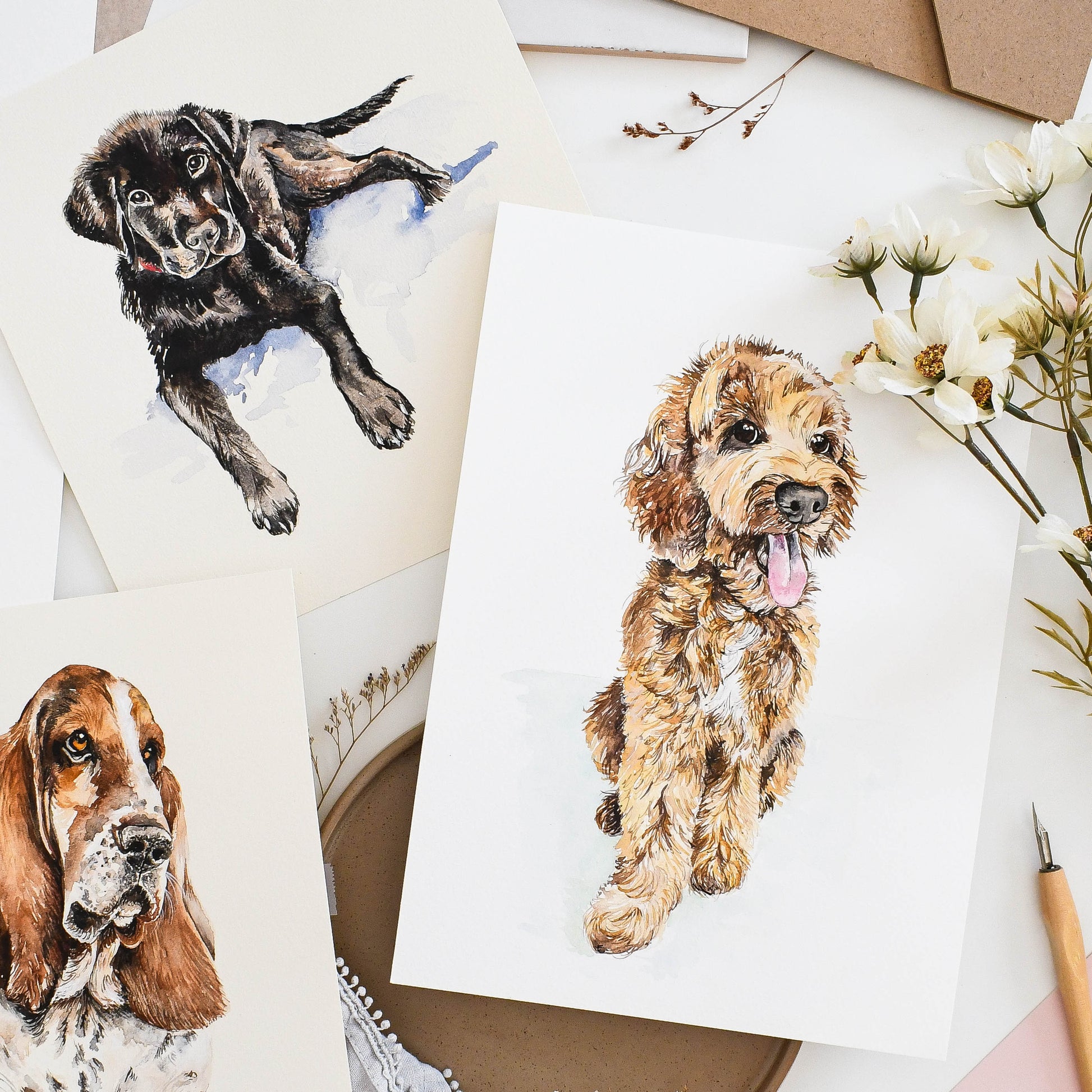 Hand-painted watercolour dog portraits — Labrador, basset hound and cockapoo