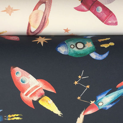 2 wallpaper rolls with space-themed design featuring space rockets, planets, and stars on a dark blue background and a white background.
