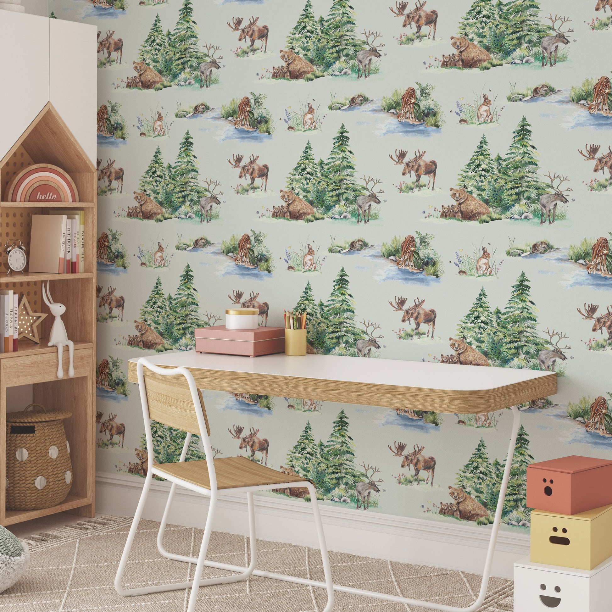 Children's room with wooden shelf, desk, and chair against a wallpapered wall with forest design.