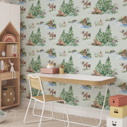Children's room with wooden shelf, desk, and chair against a wallpapered wall with forest design.