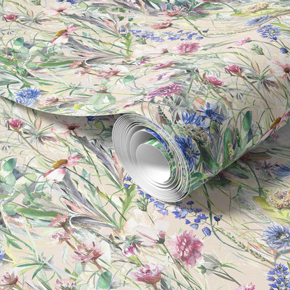Roll of meadow floral wallpaper with a variety of flowers on a light background