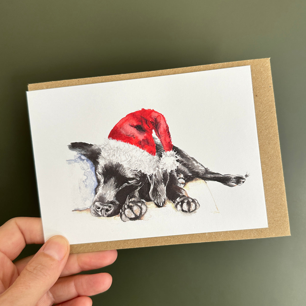 Sleeping Puppy in Santa Hat Christmas Card