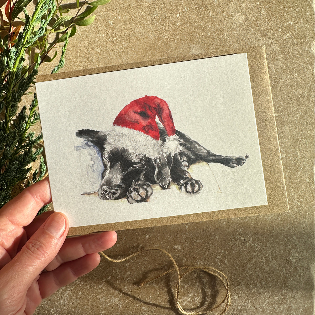 Sleeping Puppy in Santa Hat Christmas Card