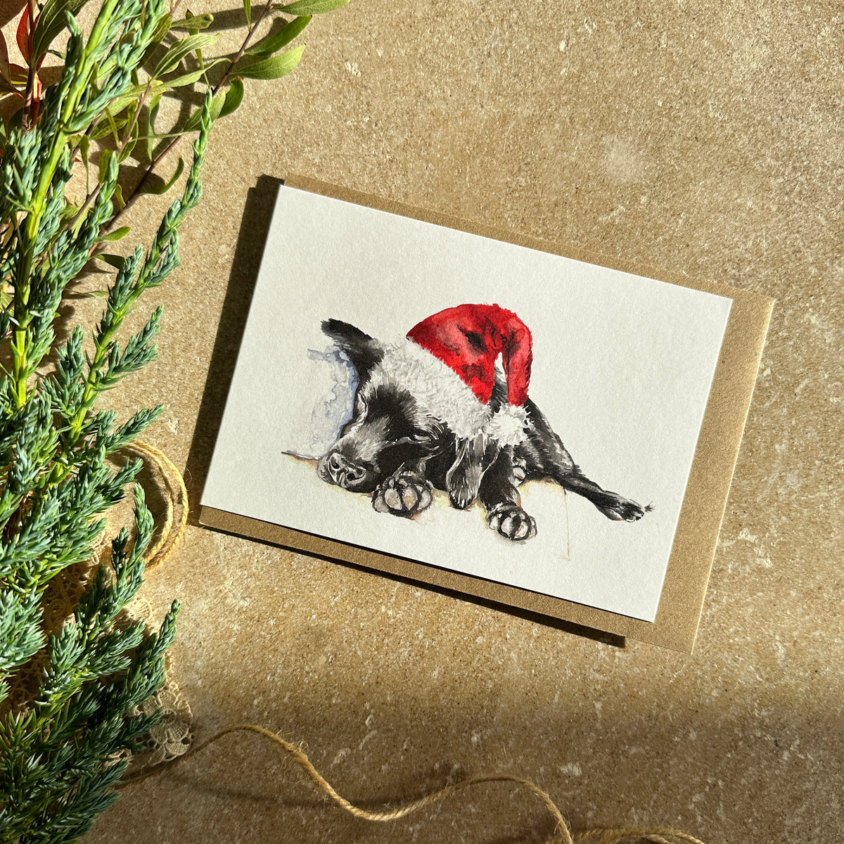 Sleeping Puppy in Santa Hat Christmas Card