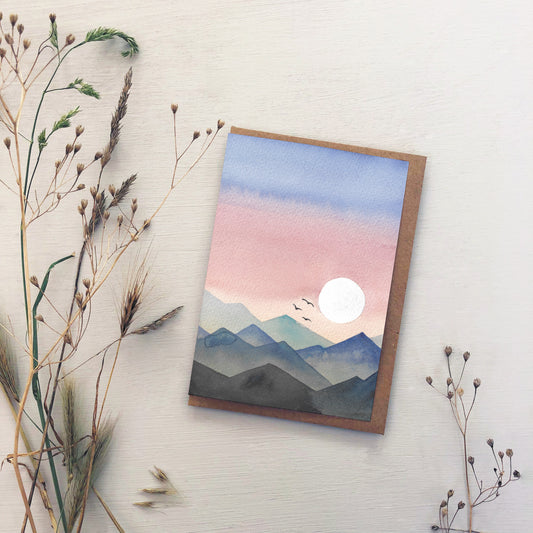 Watercolour Mountain Sunset Greeting Card – Layered Blue & Pink Landscape with Birds